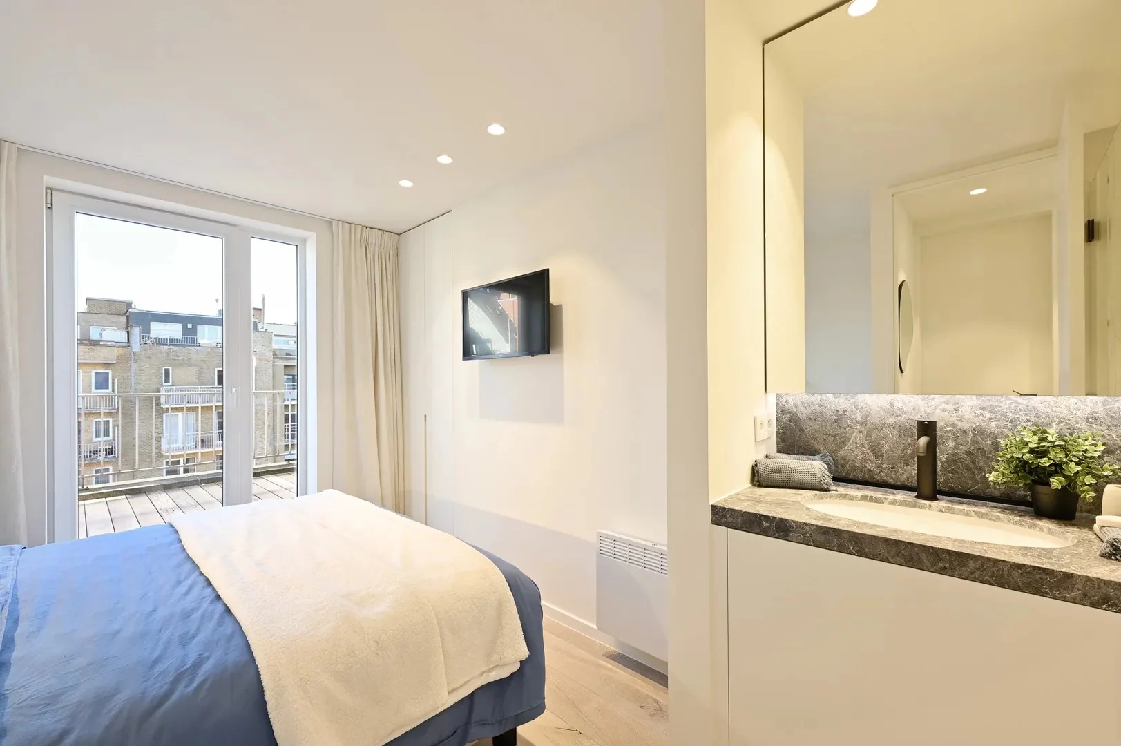 Penthouse-appartement vlakbij de zeedijk met zonneterrassen