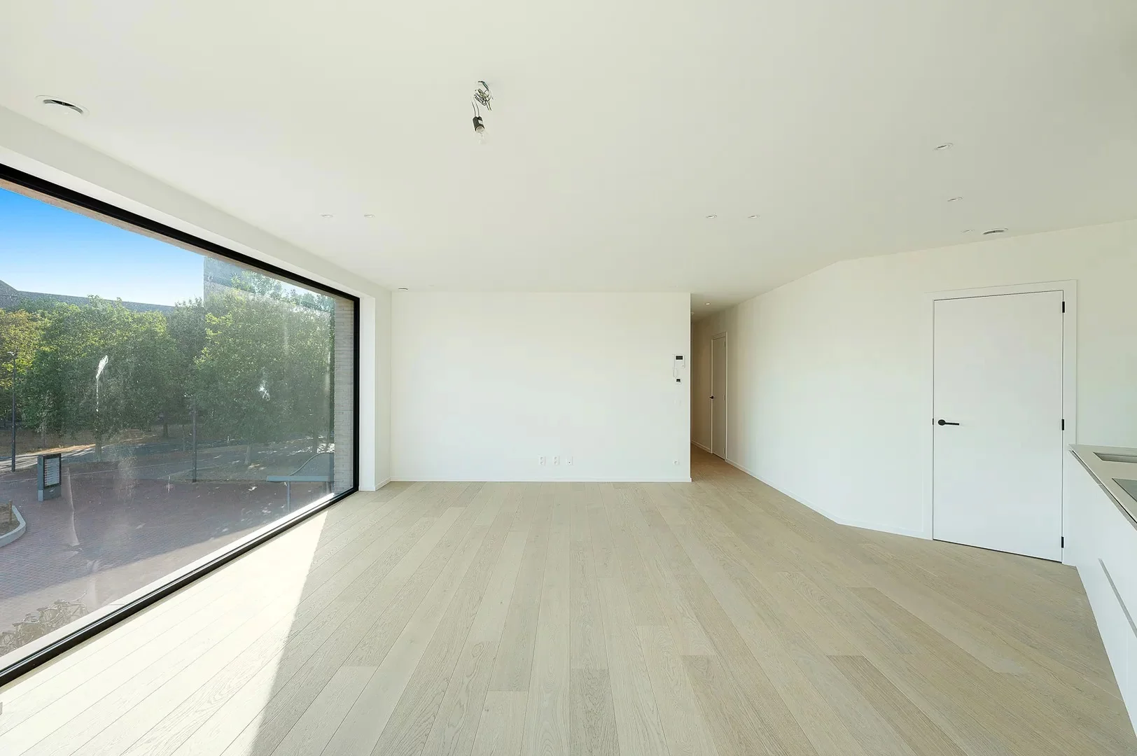 Stijlvol nieuwbouwappartement met open uitzicht nabij centrum.
