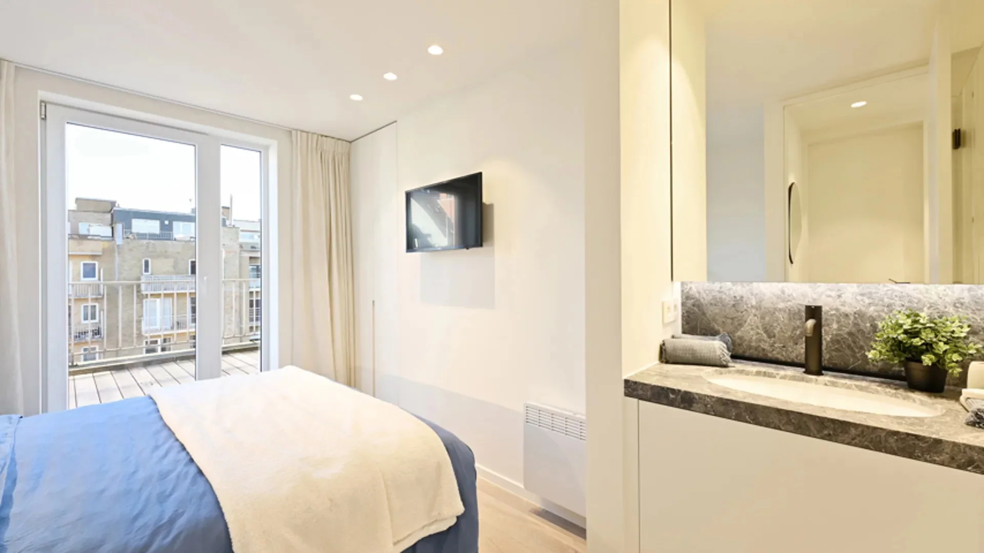 Penthouse-appartement vlakbij de zeedijk met zonneterrassen