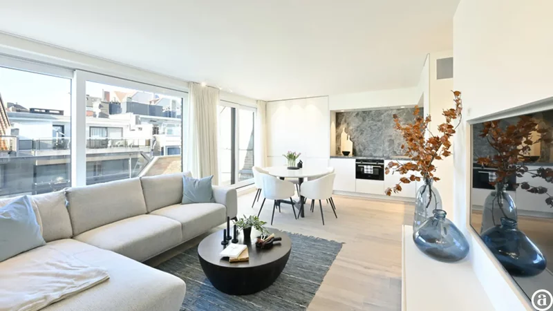Penthouse-appartement vlakbij de zeedijk met zonneterrassen