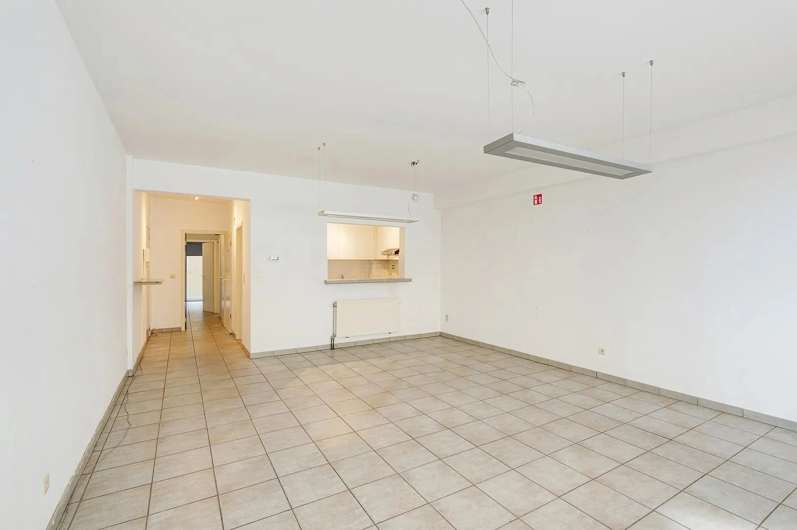 Te renoveren gelijkvloers appartement op topligging nabij het Rubensplein.