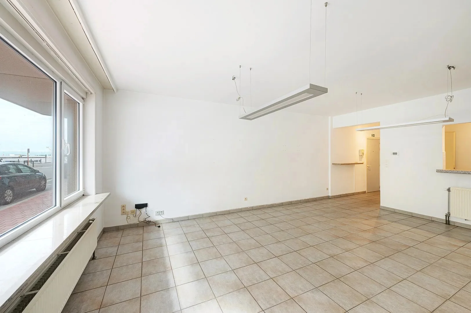 Te renoveren gelijkvloers appartement op topligging nabij het Rubensplein.