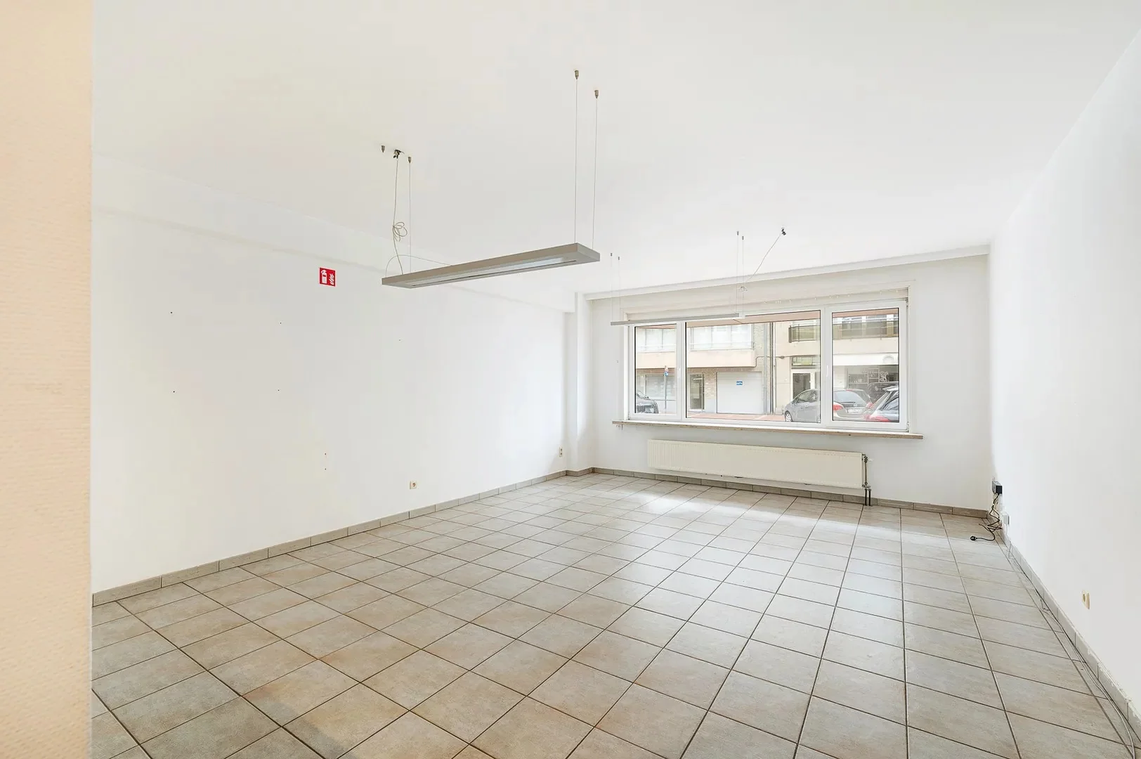 Te renoveren gelijkvloers appartement op topligging nabij het Rubensplein.